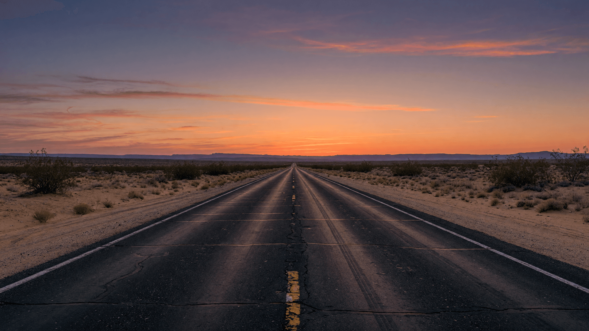Empty Desert Highway at Sunset
