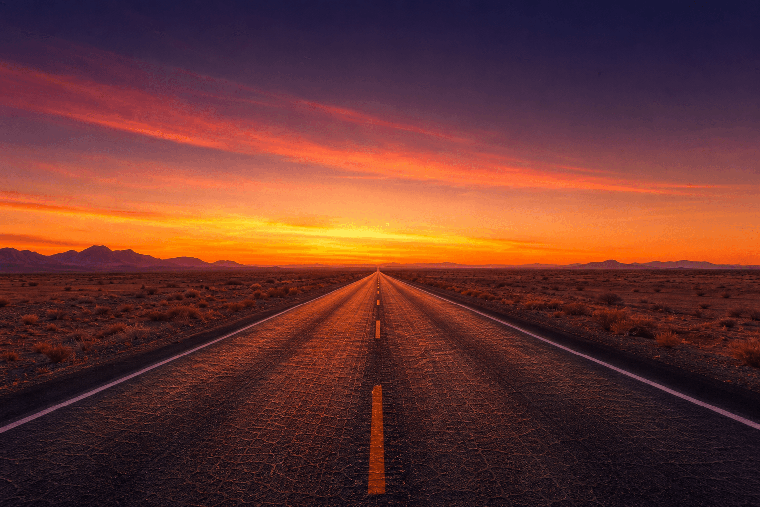 Empty Desert Highway at Sunset